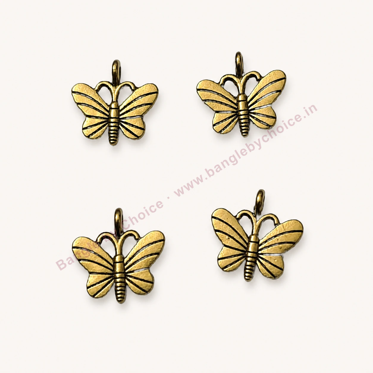 Antique Gold Butterfly Charms premium product photo with Bangle By Choice watermark and phone number